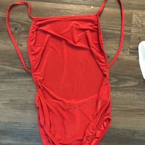 Red body suit